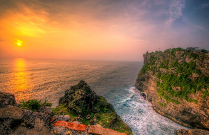 Uluwatu bali temple sunset traveldigg charm via